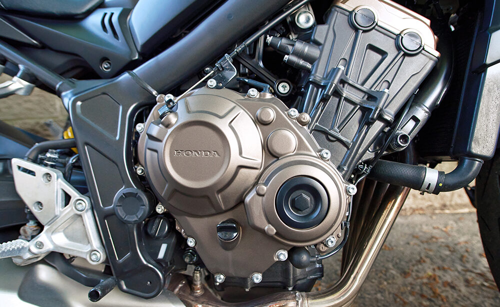 Minsk, Belarus. Apr 27, 2024. Honda motorcycle engine close up. Chrome motorcycle engine block